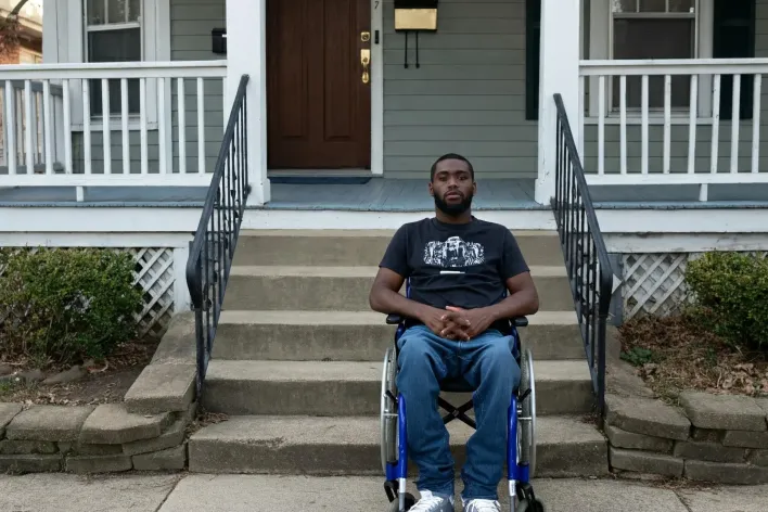 Beautifully decorated wedding reception table with golden accents and floral centerpiece.